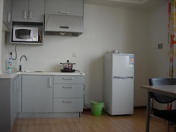 E-Jia Hotel Apartment Hangzhou Fenghua ภายนอก รูปภาพ